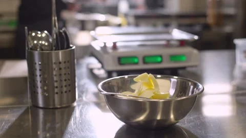 Work of a confectioner. Baking macarons. Dough butter close-up. Baking cookies a Stock Footage 233294890