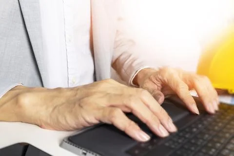 Work of construction and system engineers, filling in work data and work sc.. Stock Photos