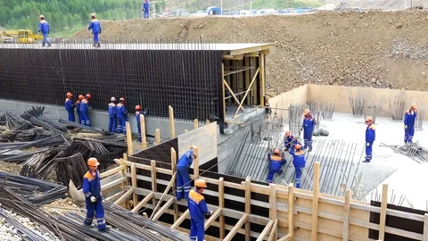Work on the construction of columnar and pile foundation of a building structure Stock Footage 73823079