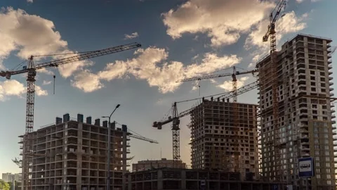 The work of construction cranes on the background of flying clouds, time laps Stock Footage 155131389