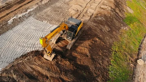 The work of construction equipment, the construction of a road in the city of Stock Footage 218047147