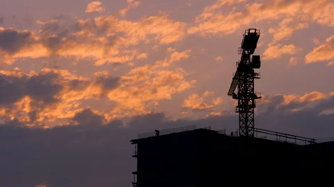 Work on the construction site of an apartment building.  Stock Footage 164336487