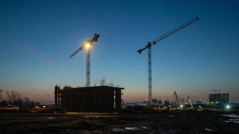 Work on construction site at evening. 4K. Time lapse. Stock Footage 125672098