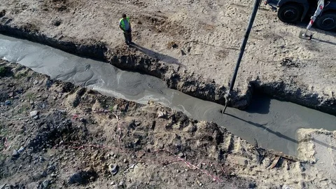 Work on the construction site, pouring foundations, aerial view Stock Footage 123701567
