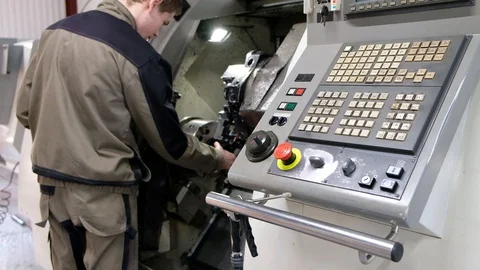 Work on the control panel of machine CNC. Metalworking milling machine Stock Footage 101976163