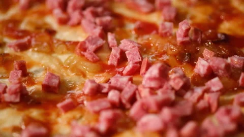 Work of cook. Close up of pizza with tomato paste, sausage Stock-Footage 235787978