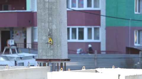 The work of a crane, bar is raised on the background an apartment building Stock Footage 62802242