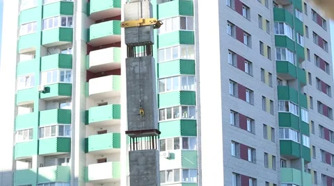 The work of a crane, bar is raised on the background an apartment building Stock Footage 62802243