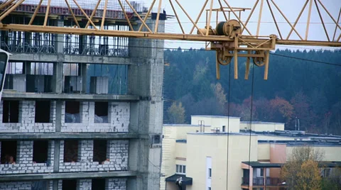 The work of a crane at a construction site Video stock 32278516