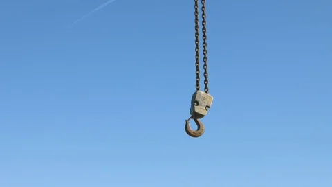 Work crane hook hanging on the blue sky Stock-Footage 76591717