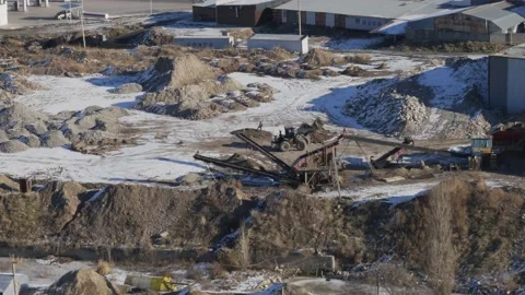 Work of cranes and cement trucks in an old factory in winter in Bishkek Stock Footage 226310098