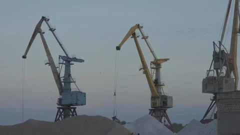 The work of cranes on the pier in the evening. Stock Footage 137088022