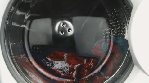 The work cycle of the washing machine. Close-up Vídeos de archivo 72479103