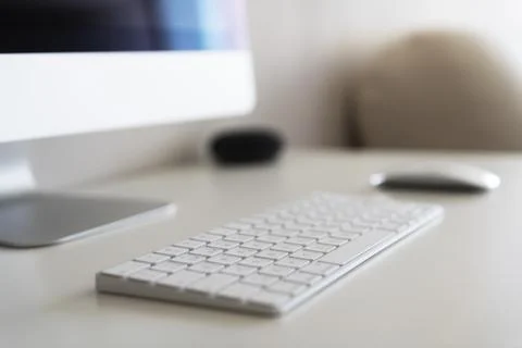 Work desk with a computer on a blurred background 스톡 사진