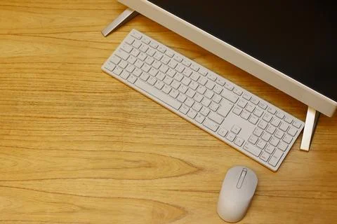 Work desk with keyboard, mouse and computer monitor - copy space Stock Photos