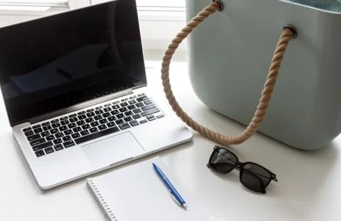 Work desk with laptop and notebook Stock Photos