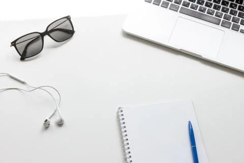 Work desk with laptop and notebook Stock Photos
