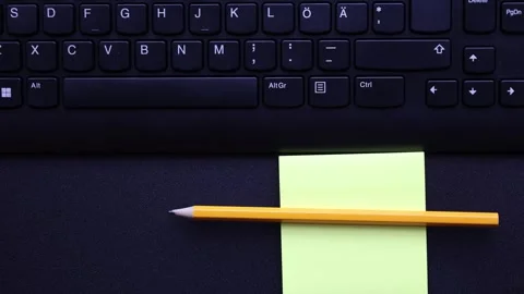 Work desk or table. Paper, pencil and keyboard. Stock Footage 296822052