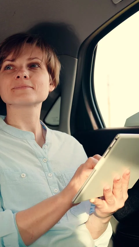Work distance learning, Travel car. Joyful young student girl is working with Stock Footage 306245950