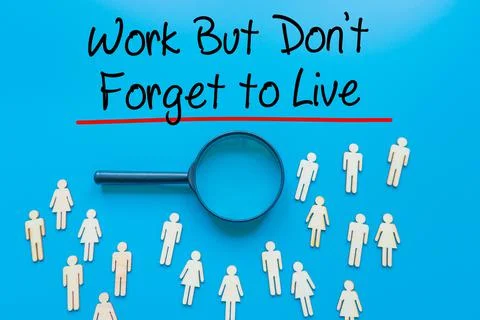 Work But Don't Forget to Live  Sign on white paper. Man Hand Holding Paper wi Stock-Fotos