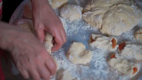 Work with the dough. Preparation for baking buns Stock Footage 129515669