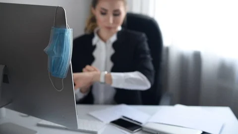 Work during self-isolation and quarantine. Young woman employee works in the Stock Footage 129557269