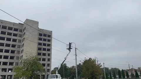 The work of an electrician installing street lighting. Stock Footage 251661828