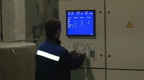 Work enters data into the control panel. Launcher. Electric. Stock Footage 57216994