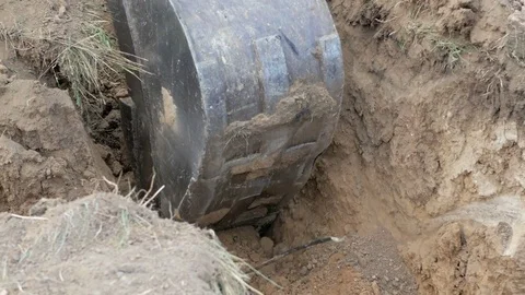 Work excavator damaging optical cable Stock Footage 80811925