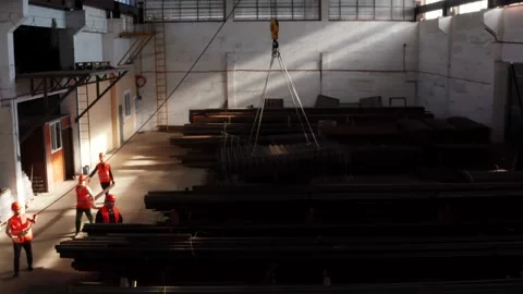 Work is in full swing in a huge metal rolling shop Stock Footage 135314915