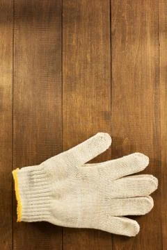 Work  gloves on wood Stock Photos