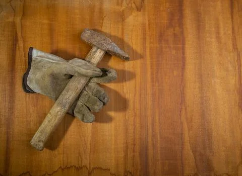 Work gloves with wrenches, on background, metal, rust, retro tool, vintage Stock Photos