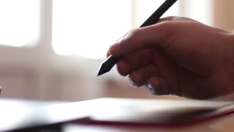 Work on a graphic tablet. Hand and stylus Stock Footage 120796917