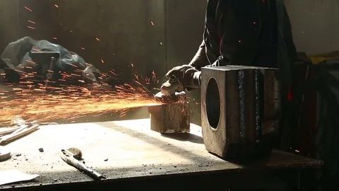 Work grinds after welding of metal parts Stock Footage 75464804