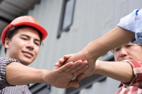 Work group of engineer people joining hands Stock Photos