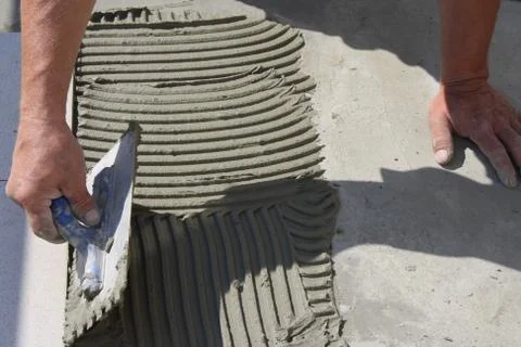 Work with grout Stock Photos