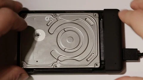 Work hard disk inside on a white background Stock Footage 73637964