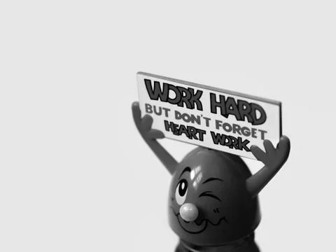 'WORK HARD BUT DON'T FORGET HEART WORK' Stock Photos