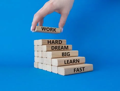 Work hard Dream big Learn fast symbol. Wooden blocks with words Work hard D.. Stock Photos