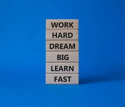 Work hard Dream big Learn fast symbol. Wooden blocks with words Work hard D.. Stock Photos