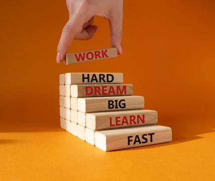Work hard Dream big Learn fast symbol. Wooden blocks with words Work hard D.. Stock Photos