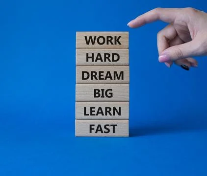 Work hard Dream big Learn fast symbol. Wooden blocks with words Work hard D.. Stock Photos