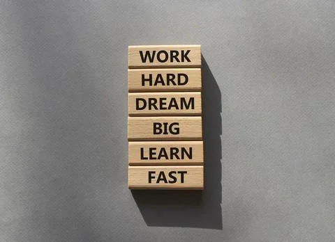Work hard Dream big Learn fast symbol. Wooden blocks with words Work hard D.. Stock Photos