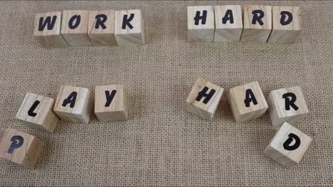 Work Hard Play Hard Word Made with Building Wooden Cube Blocks Stock Footage 268181426