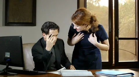 Work heated argument  between business woman and his employee in the office Stock Footage