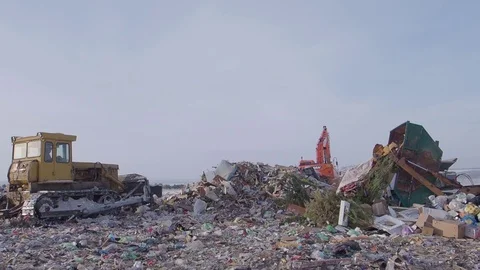Work of heavy machinery in garbage dump in winter, Russia Stock Footage 101949293