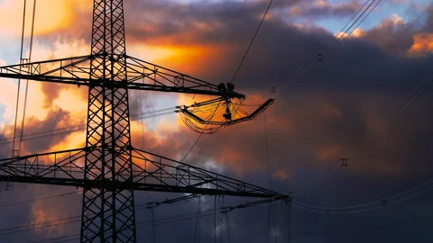 Work on high-voltage lines during sunset Video stock 163084586