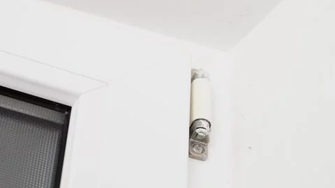 The work of the hinge of a plastic door, opening and closing the door close-up Stock Footage 244899638