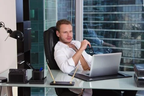 Work at home. Attractive guy. Stock Photos