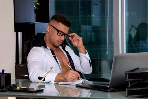 Work at home. Attractive guy. Stock Photos